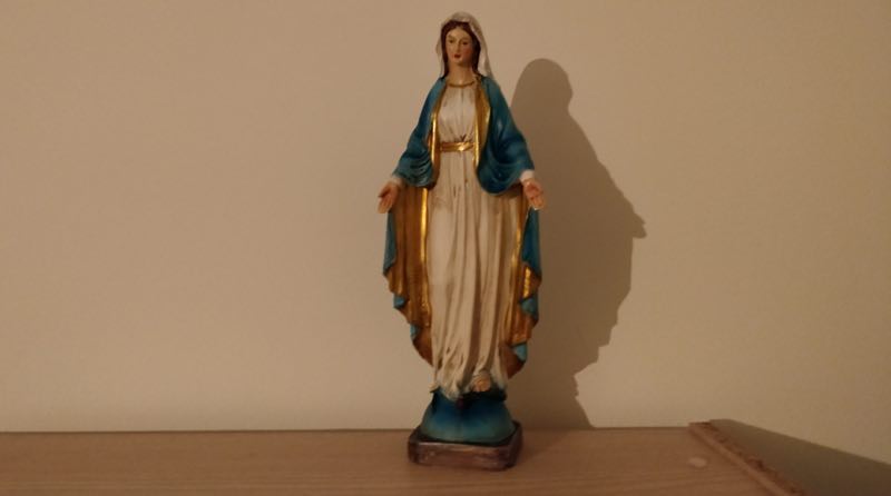 Example of a possible misclassification: The statue of Mary looks like a human but it is not. Adding this example to the learning examples will further improve the algorithm